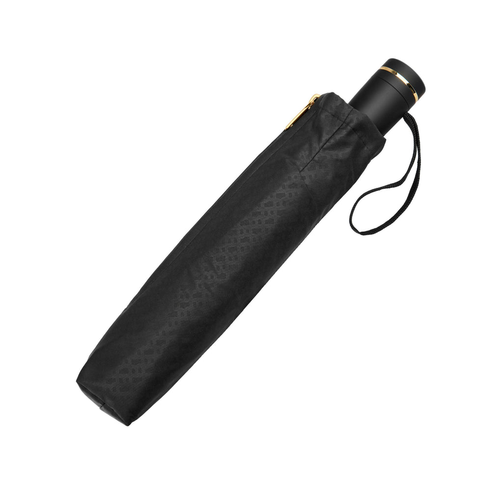 BOSS black umbrella with gold accents on a white background